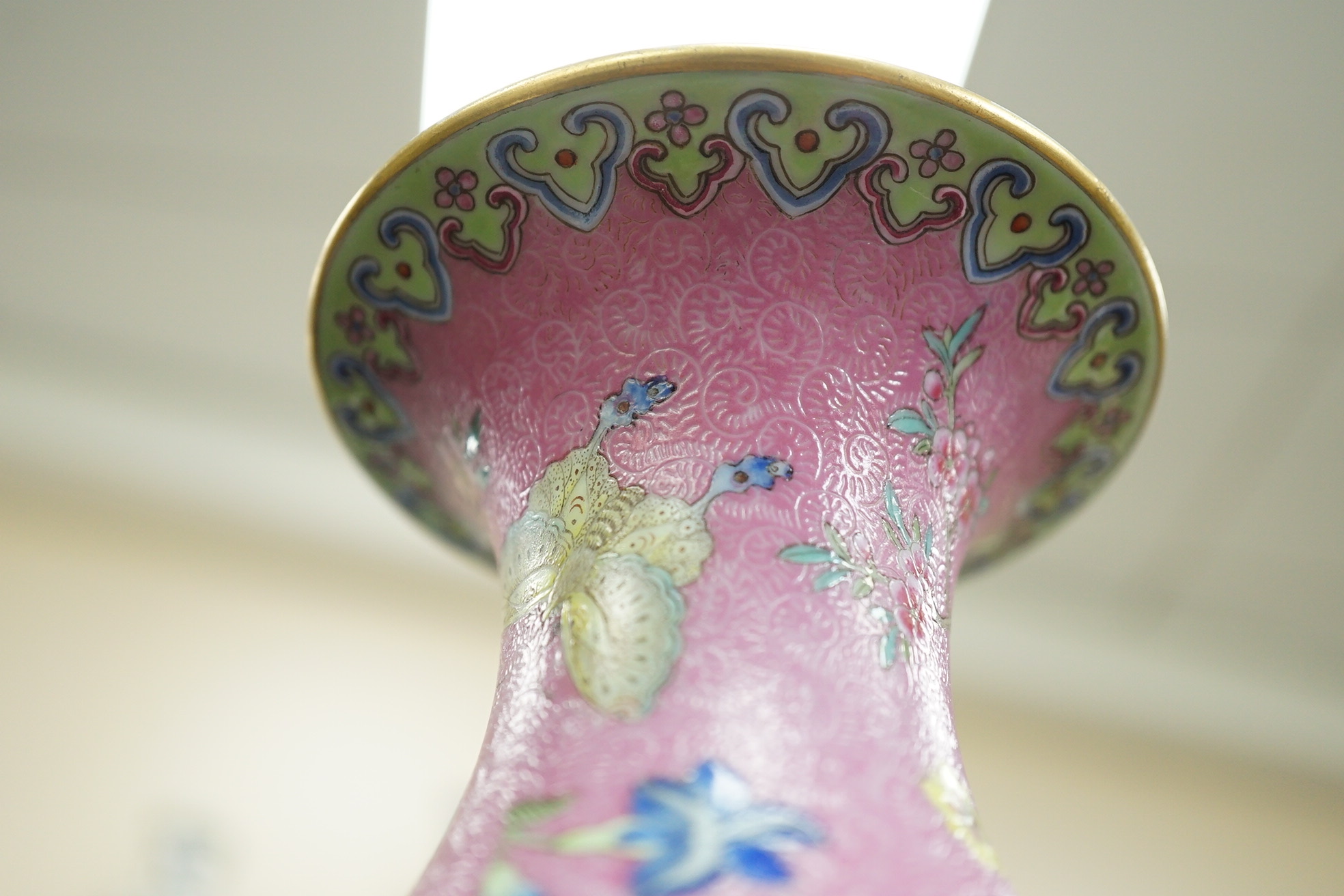 A Chinese pink-ground sgraffito pear-shaped vase, yuhuchunping, Daoguang six character seal mark and of the period (1821-50)